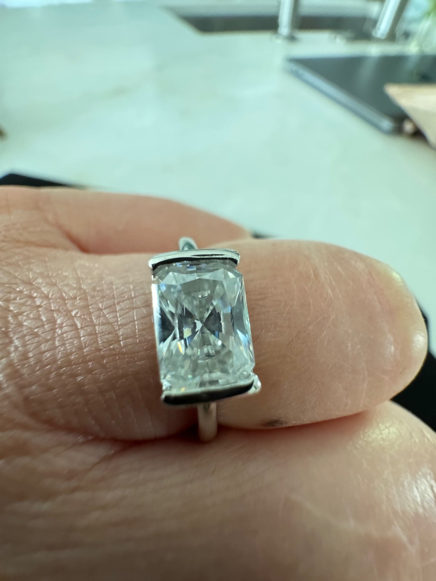 East to West Moissanite Ring